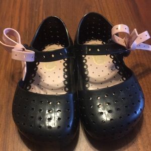 Mini Melissa black Mary Janes with pink bow